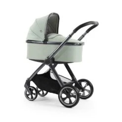 Oyster 4 Essential Bundle | Pistachio 26 Oyster 4 Essential Bundle | Pistachio -Beautiful Bambino Oyster4 Pistacho Carrycot On Chassis Angle 1